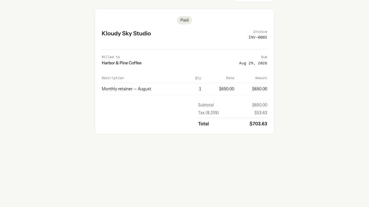 The public invoice page marked Paid